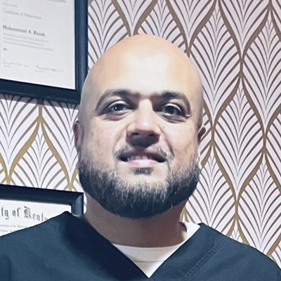 A headshot photo of Dr. Muhummad Asif Razak, a chiropractor at Razak Chiropractic.